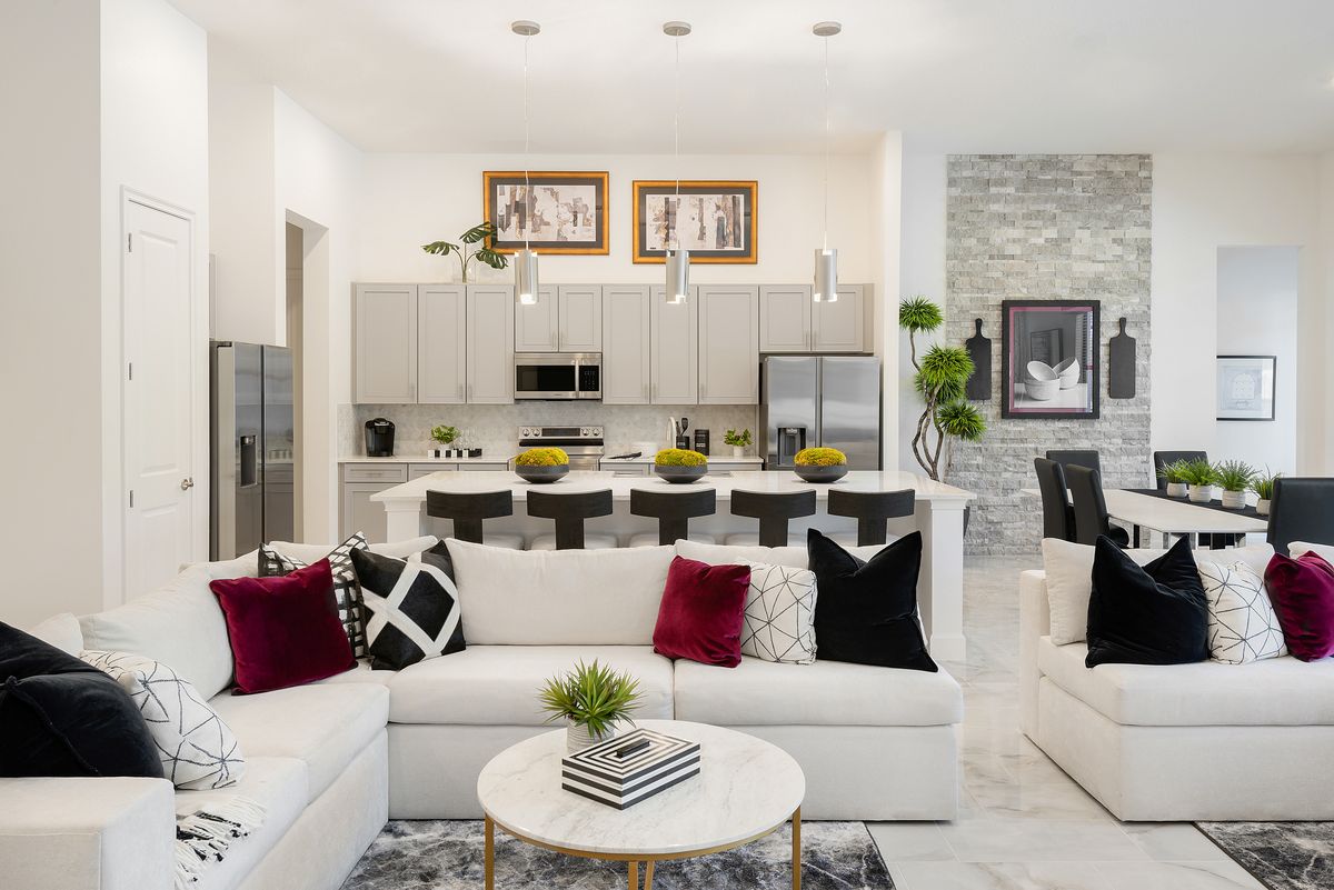 Waterfall Living Room. Paradiso Grande Resort New Homes in Orlando, FL