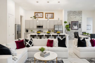 Waterfall Living Room. Paradiso Grande Resort New Homes in Orlando, FL