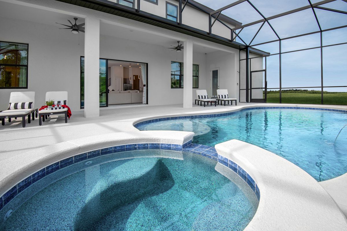 Waterfall Pool. Paradiso Grande Resort New Homes in Orlando, FL