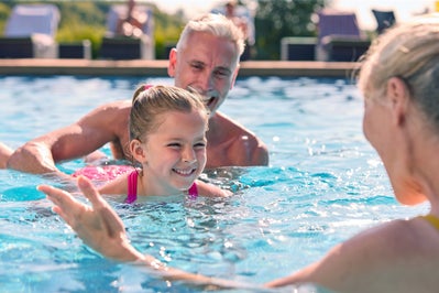 Pool with Grandparents. Leela Reserve Paired Villas New Homes in Tavares, FL