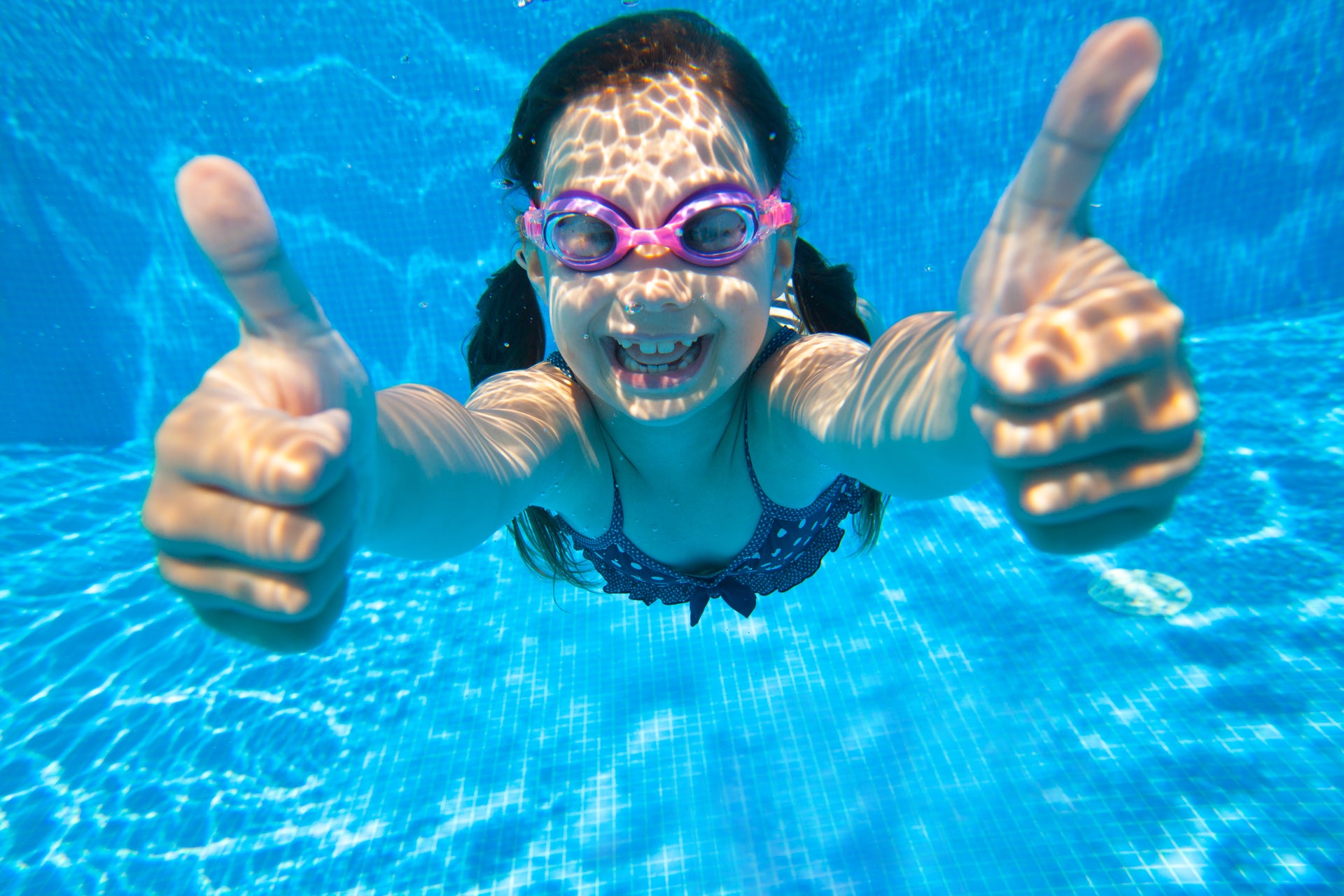 Underwater thumbs up pool Lifestyle. New Homes in Parrish, FL