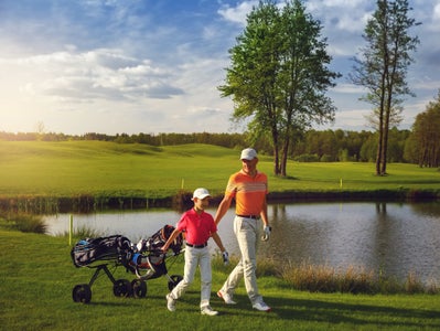 Golf Father and Son. New homes in Orlando, FL